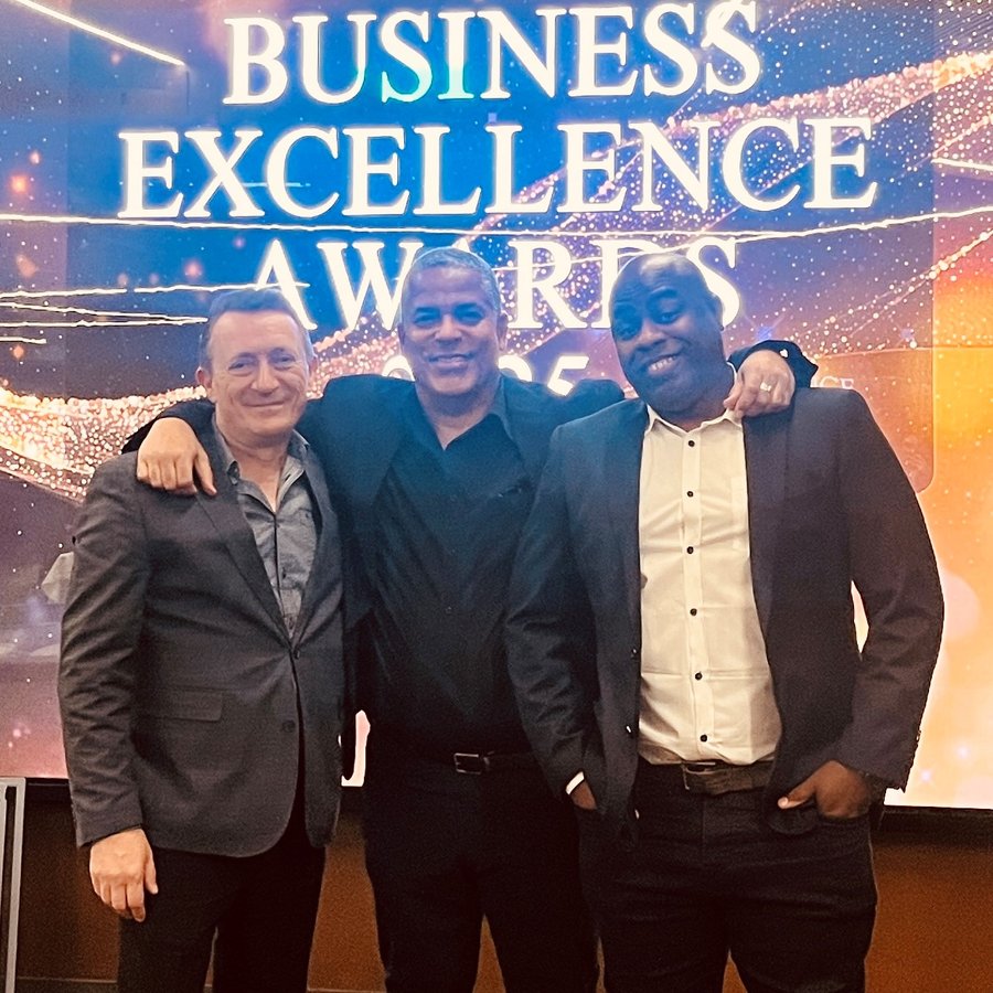 Sellutions' three managing partners celebrating together at the Business Excellence Awards