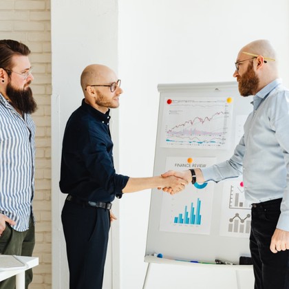 Sales team closing a deal in a presentation